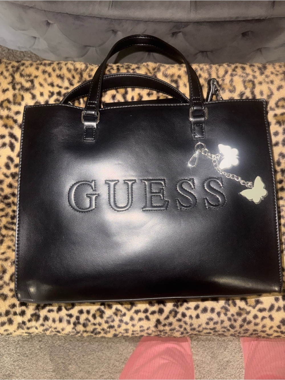 GUESS Black Tote with Embossed Logo and Butterfly Charms